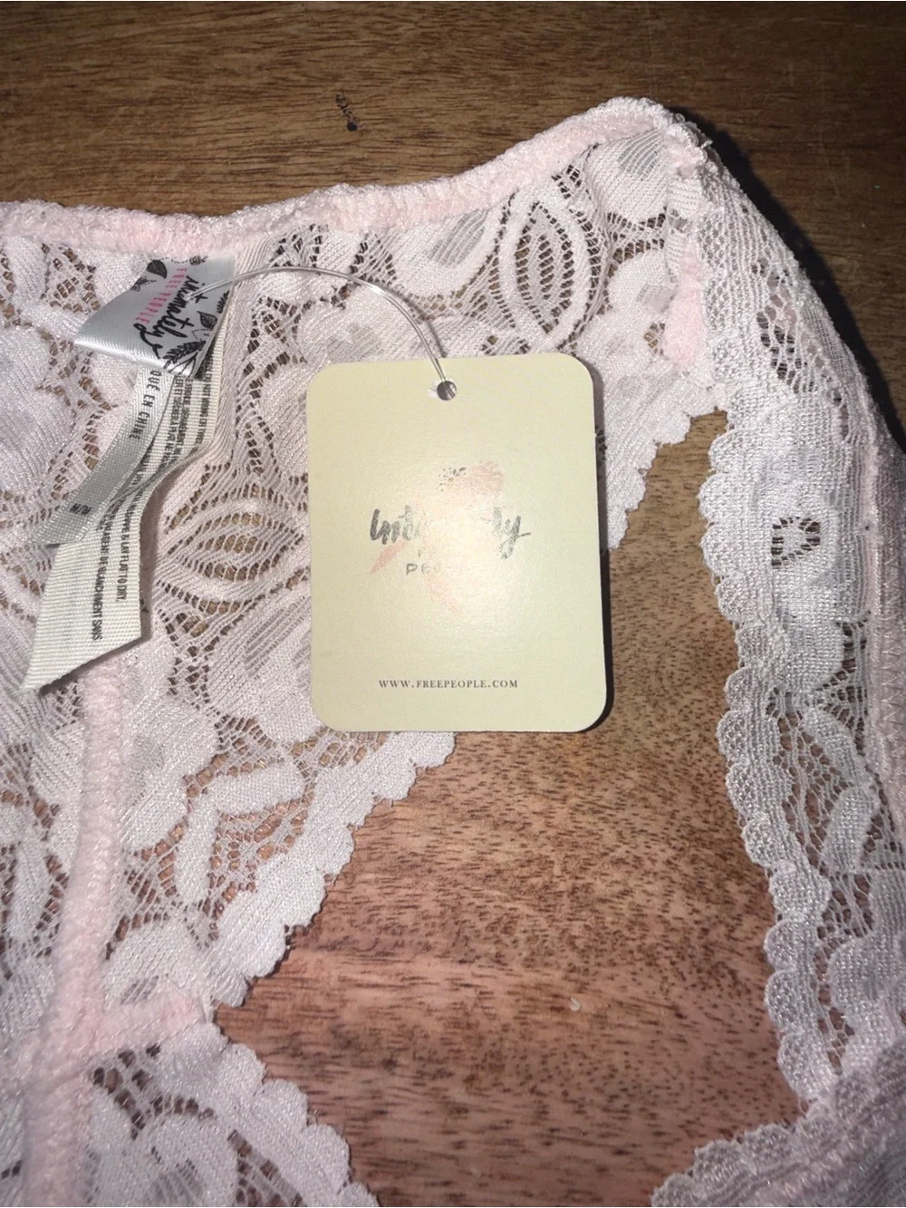 NWT. Free People Intimately. Galloon Lace Racerback Bralette. Pale Pink. Med.
